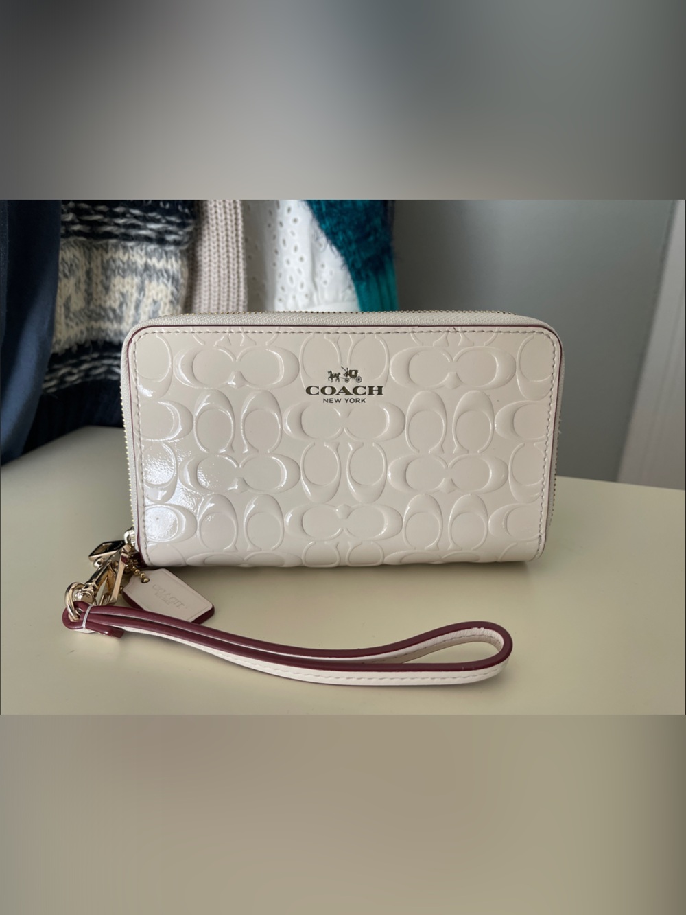 Coach Cream Patent Leather Wristlet with Pink-Trim Strap